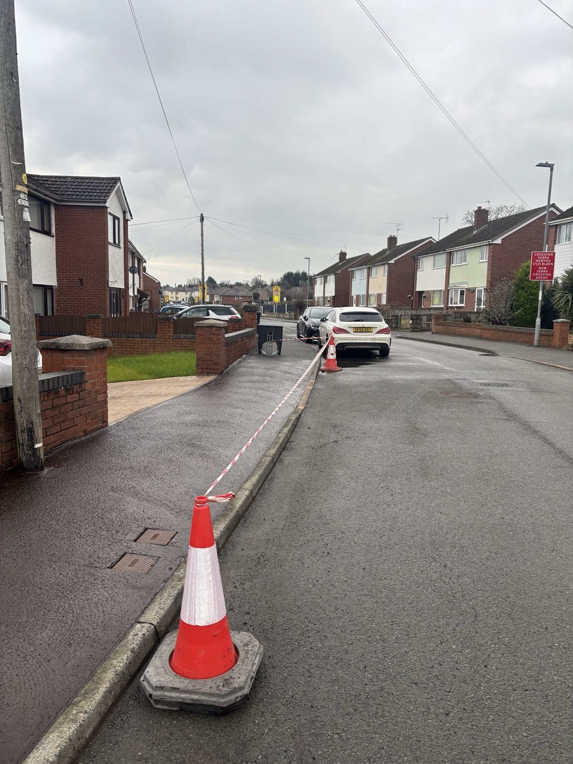 Completed footway slurry-sealing project on a residential street