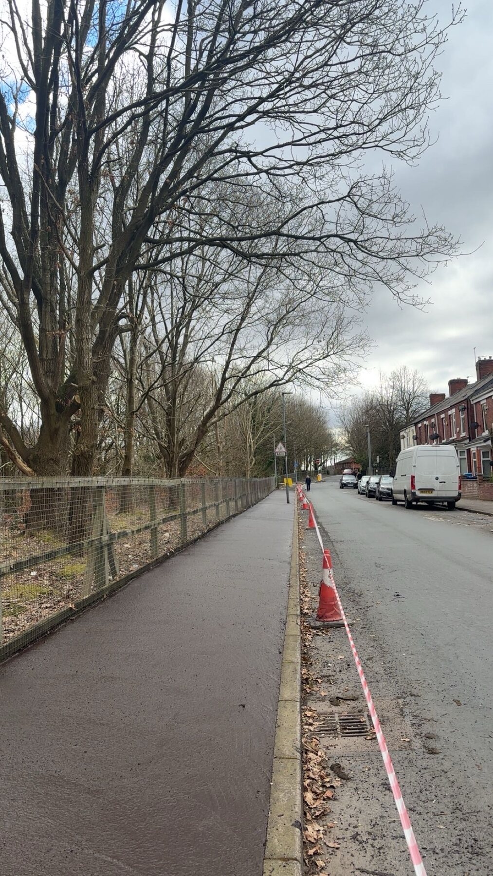 Long completed footway beside a residential road